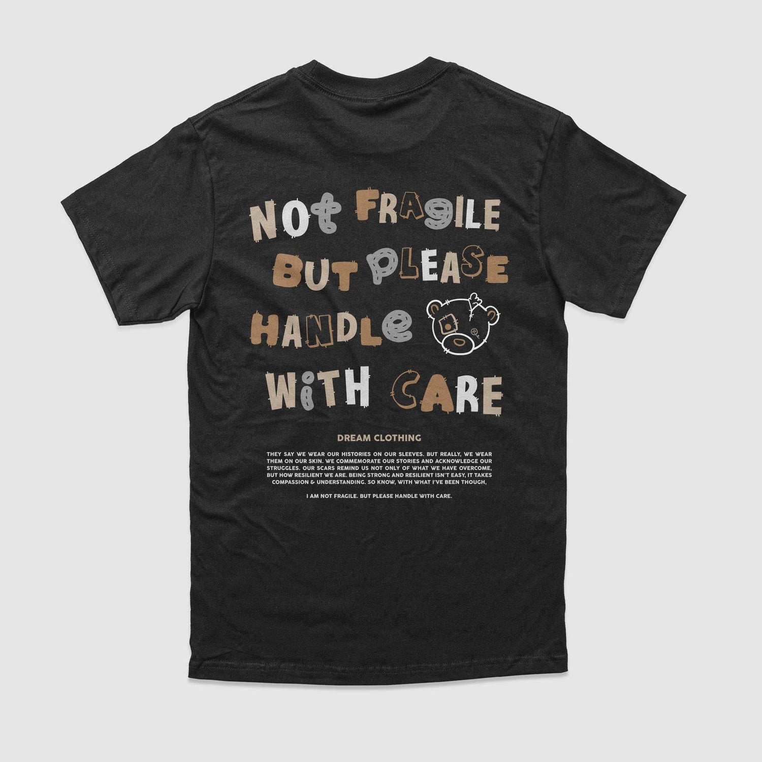 Not Fragile But Please Handle With Care Tee
10% Donated to our Non-Profit Mental Health Awareness Partners
5.3 oz Tee | 100% Cotton
Unisex sizing
Fits true to size.
DREAM Clothing